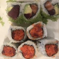Wasabi Roll · Tuna, salmon and avocado on the inside and wasabi and roe on the outside.