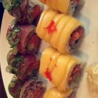 Mars Roll · Wrapped with peppe tuna and jalapenos on the outside and spicy tuna, avocado and crunch on t...