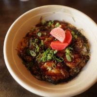 Pork Belly and Umami Gravy Bowl · Braised pork belly, umami gravy, seaweed, scallions and pickled red radish.