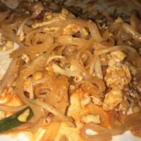 Pad Thai · Sauteed rice noodles with egg, scallions and bean sprouts with ground peanuts.