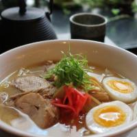 Miso Ramen · Miso flavored soup with pork, egg and vegetables.