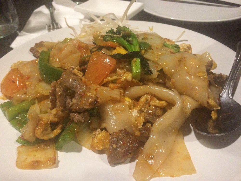 Drunken Noodles · Sauteed wide rice noodles, egg, bell peppers, onions, basil and tomatoes. Spicy.