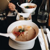 Tonkotsu Ramen · Pork bone flavored soup with chashu pork, egg and vegetables.