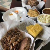 Lil Feast Platter St. Louis · 1/2 slab of St. Louis style Spare Ribs, Pulled Pork, Texas Beef Brisket, 2 sides and 1 cornb...