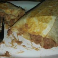 Bean and Cheese Burrito · Served with rice for an additional cost. Add sour cream or guacamole for an additional cost.