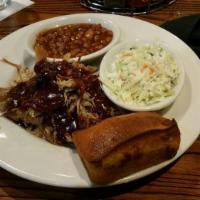 Sweet Baby Rays Pulled Pork Plate · Seasoned with dry rub, smoked low and hand pulled. Served with a side.