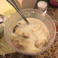 Tom Kha Soup · Mild coconut milk, mushroom, carrot, onion, touch of lime, galangal and lemongrass.