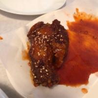 Angry Wings · Chicken wings in a sweet and savory sauce.