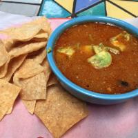 Tortilla Soup · Chicken, avocado chunks, Jack cheese in a spicy tortilla based broth.