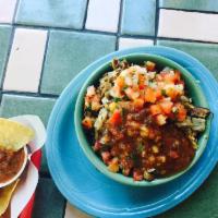 Baja Bowl · Mexican rice, pinto beans, salsa fresca and queso fresco Monterrey Jack cheese.