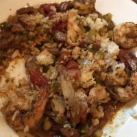 Jambalaya · Chopped chicken. andouille sausage, sauteed shrimp in a bold Cajun sauce with steamed white ...