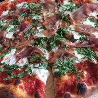 Forno Pizza · Tomato sauce, homemade mozzarella, mushrooms, arugula, Gorgonzola and prosciutto.