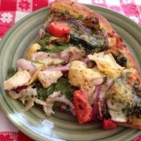 Spring Veggie Pizza · Thin crust with basil pesto, whole milk mozzarella, spinach, red onions, fresh tomatoes, art...