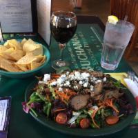 Los Reyes Salad · Flame-broiled tri-tip or chicken, walnuts and blue cheese crumbles atop a bed of spring mix ...