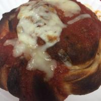 Calzone · We take your favorite meatballs and mozzarella cheese and put it inside our delicious NY piz...