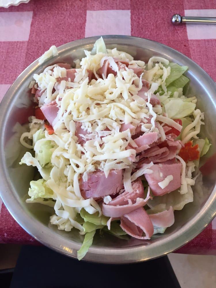 Antipasto Salad · Pepperoni, salami, ham, capocollo, mortadella, iceberg lettuce, black olives, tomatoes & mozzarella cheese.
Available in two sizes our Small feeds 1-2 people and our Large feeds 3-4 people.