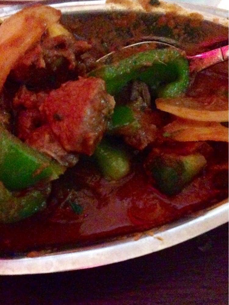 Kadhai Lamb · Lamb chunks cooked in a rich traditional curry sauce with big onion and bell pepper.