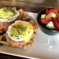 Eggs Benedict on Whole Wheat Waffle · 2 poached egg served on whole wheat waffle with fruit salad.