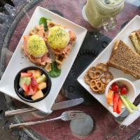 Smoked Salmon Egg Salad Sandwich · Egg Salad and Smoked Salmon Served on honey wheat bread (bread contains tree nuts) with lett...