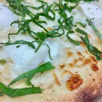 White Pizza · Ricotta, mozzarella, basil, olive oil and fresh garlic.