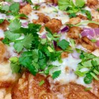BBQ Chicken Pizza · Red onions, special BBQ sauce, fresh cilantro, chicken and mozzarella cheese.