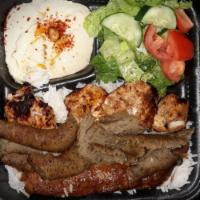 Protein Combo Plate · Your choice of 3 meats. Served with hummus, rice and salad.