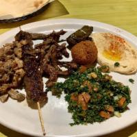 Meat Mezza · Kafta (ground beef, parsley, onions and traditional spices), chicken shawarma, falafel, humm...