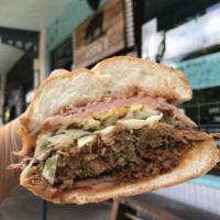 Triple Crown Sandwich · Popular. 12 hours pulled pork, ham, homemade guava BBQ sauce, cheese, and slaw. Add avocado ...