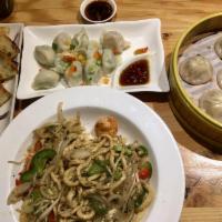 Fish and Chive Dumplings with Squid Ink · 10 pcs