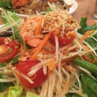 Papaya Salad · Tasty salad of Thai green papaya, green bean, tomato and peanut with chef special spicy lime...