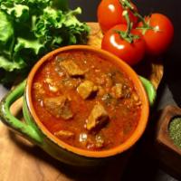 Chashushuli · Stewed beef. Slow cooked beef in stewed tomatoes, sweet onion and fresh herbs. 16oz
