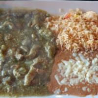 Chile Verde · Traditional fresh grilled pork tips covered with our house green sauce, served with rice, be...