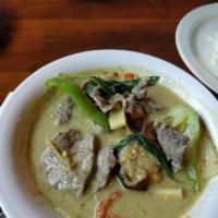 Green Curry · Your choice of meat cooked with green curry paste, coconut milk, bamboo shoot, basil, and be...