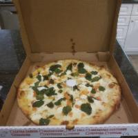 White Pizza · Ricotta cheese, garlic, fresh tomato, spinach, mozzarella cheese and olive oil. No red sauce.