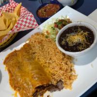 Enchiladas · Each plate comes with your choice of any of our savory meats. Two enchiladas smothered with ...