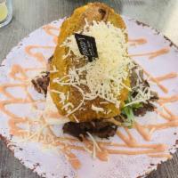 Patacon Deluxe · Choice your patacon with churrasco Angus, mano cheese, lettuce, tomato and pink sauce, toppe...