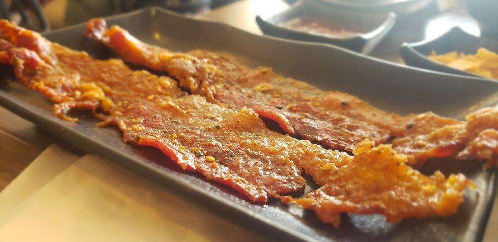 Rokaru Candied Bacon · Four pieces of applewood smoked bacon baked with honey, brown sugar, and togarashi spice.