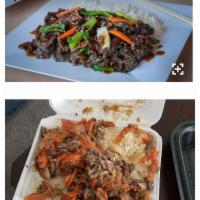 Bulgogi · Sweet soy marinated thin sliced Korean rib eye with peppers, carrots, onions, and rice.