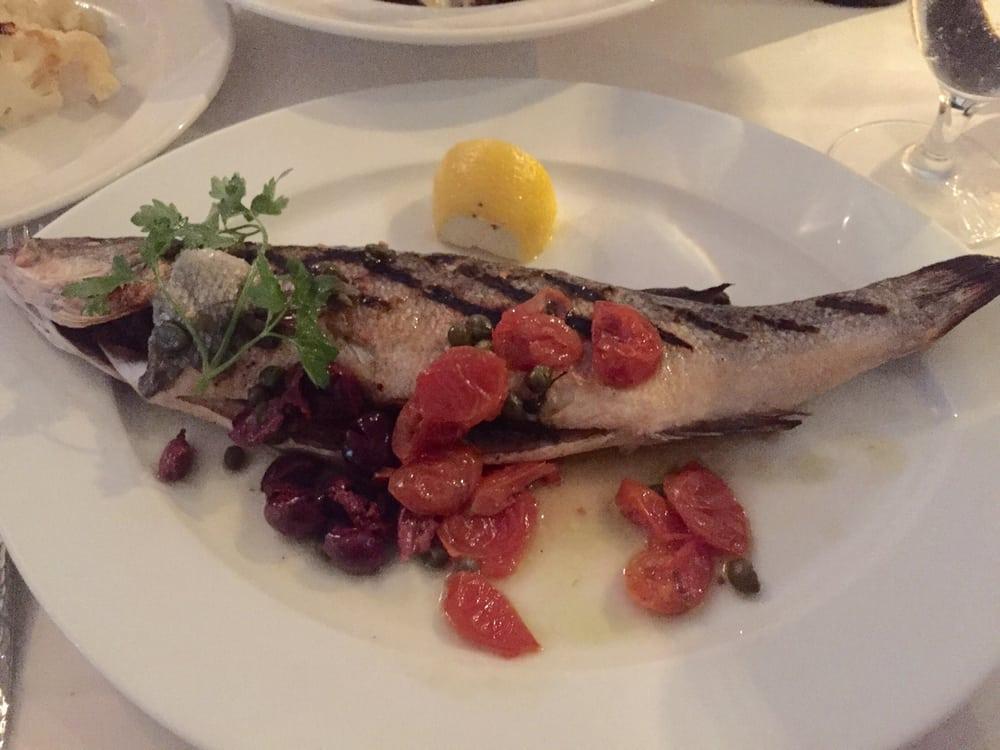 Branzino · Oven roasted whole Branzino served with mashed potatoes and vegetables of the day