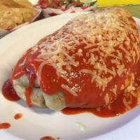 Super Burrito · Served with meat, beans, rice, guacamole, cheese, sour cream, and salsa.