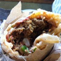 Regular Burrito · Served with meat, beans, rice and salsa.