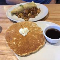 Cajun Crepe · A taste of the South in a crepe with whipped eggs, andouille sausage, ham, white and green o...