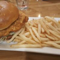Big Fish Sandwich · Fried wild-caught Atlantic cod, lettuce, and tomato topped with sunset remoulade sauce.