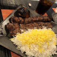 Beef Soltani · 1 skewer of barg and 1 skewer of koobideh Served with Basmati Rice and Grilled tomato 