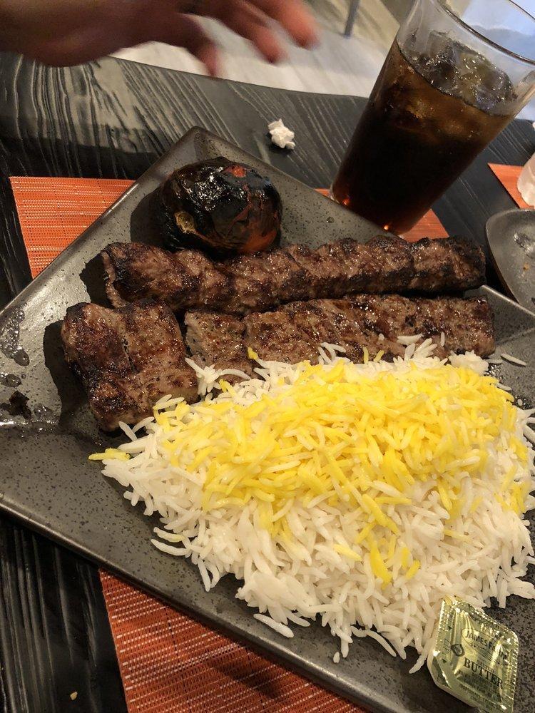 Beef Soltani · 1 skewer of barg and 1 skewer of koobideh Served with Basmati Rice and Grilled tomato 