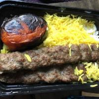 Koobideh Kabob · 2 skewers of mixed ground beef and lamb. Served with Basmati Rice and Grilled tomato 