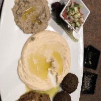 Veggie Mezza · Hummus, baba ghanoush, falafel, shirazi and kashkeh bademjan. Vegetarian and gluten free.
