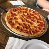 Classic Pepperoni Pizza · Red sauce, mozzarella cheese topped with old world pepperoni.