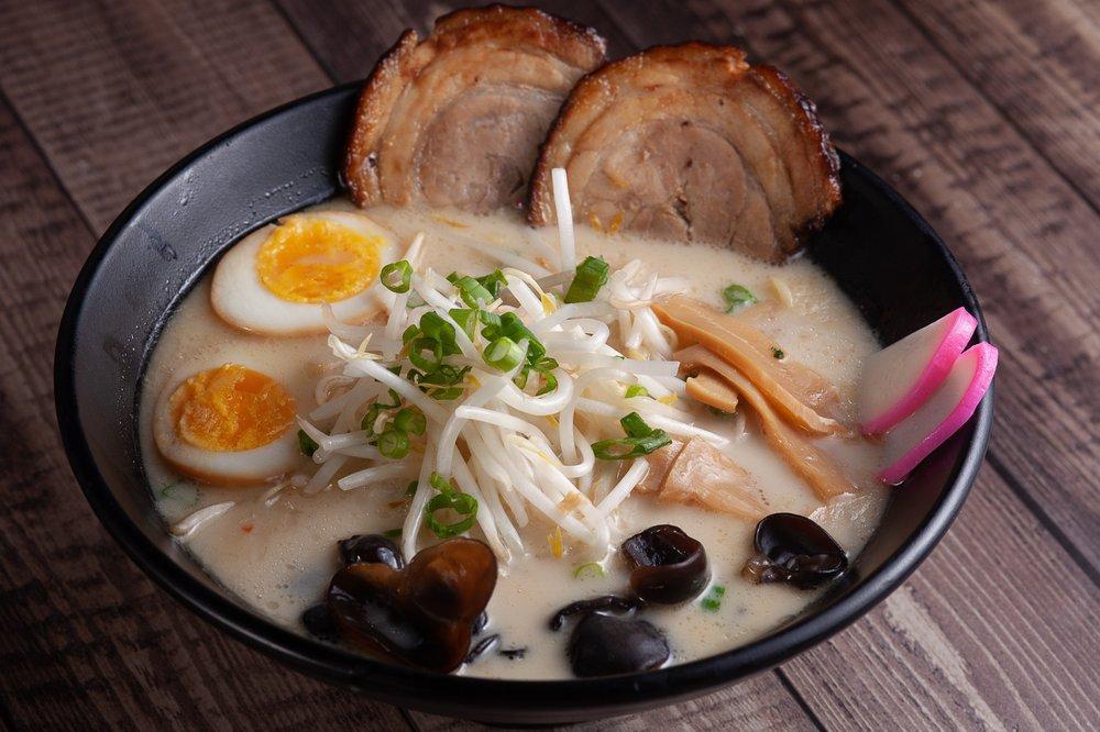 Tonkotsu Ramen · Creamy pork soup base. Roasted pork, boiled egg, kikurage mushroom, bamboo shoots, green onion, sprouts, fish cake.