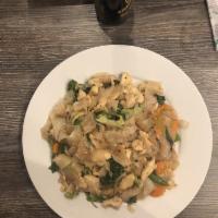 Drunken Noodle · Wide rice noodle, yellow onion, carrot, broccoli, cabbage, bell pepper, jalapeno and basil. ...